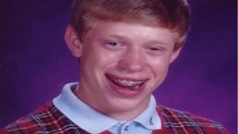 Bad Luck Brian smiling in his school yearbook portrait